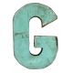 Wooden letter G made out of old fishing boats