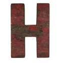 Wooden letter H made out of old fishing boats