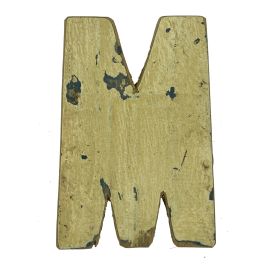 Wooden letter M made out of old fishing boats
